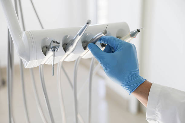Professional Tooth Extraction technician working in Sullivan City, TX
